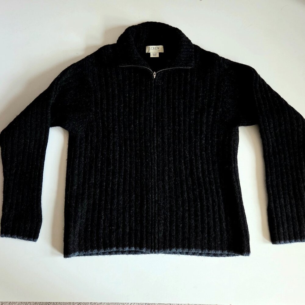 J.Crew 100% wool Shetland men black sweater w/blue trim and zipper on the front.